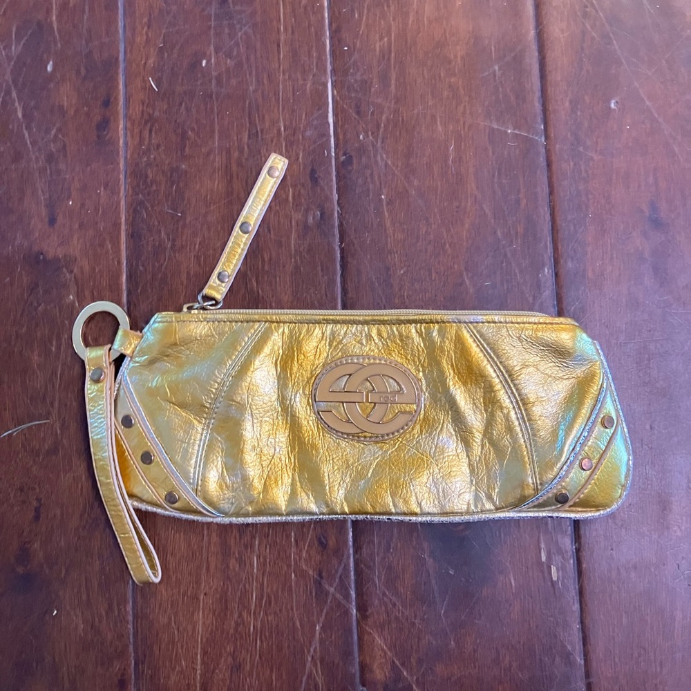 Red by Marc Ecko Metallic clutch